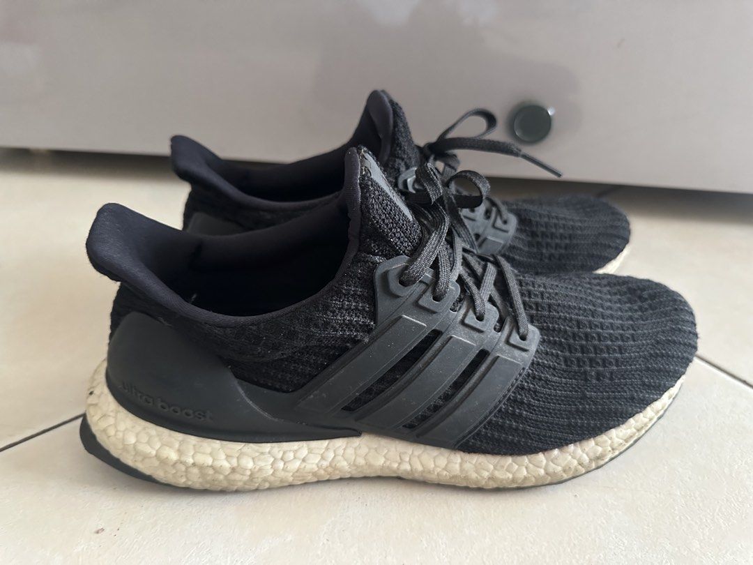 Adidas Ultra Boost Black Running Shoes (Category: Sneakers) located in Mandaluyong City. Submitted by miaaaa32 (Listing ID 1441424009, Image 2). Description: - Adidas Ultraboost 4.0 - Color: Black - Size: Mens US 8.5 - Signs of wear (please check photos) - Plenty of life left for running or casual wear - Comfortable and stylish kicks Open to nego Return and refund only if product is defective. Pay full amount first before delivery. Payment option
