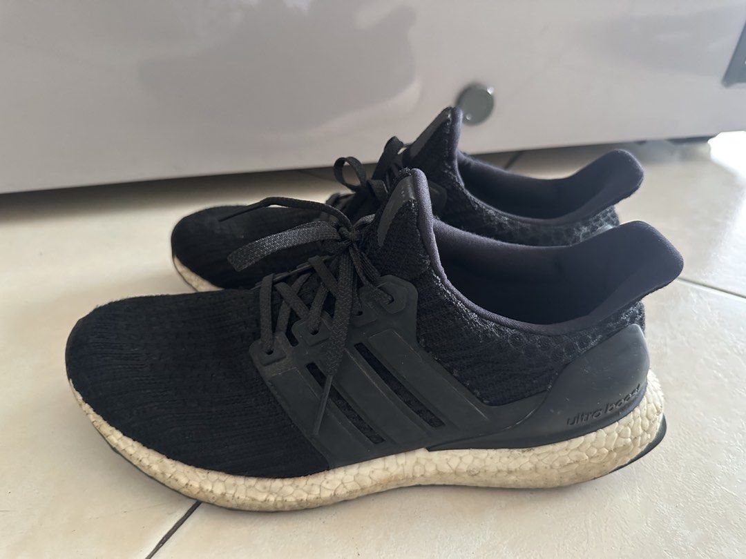 Adidas Ultra Boost Black Running Shoes (Category: Sneakers) located in Mandaluyong City. Submitted by miaaaa32 (Listing ID 1441424009, Image 1). Description: - Adidas Ultraboost 4.0 - Color: Black - Size: Mens US 8.5 - Signs of wear (please check photos) - Plenty of life left for running or casual wear - Comfortable and stylish kicks Open to nego Return and refund only if product is defective. Pay full amount first before delivery. Payment option