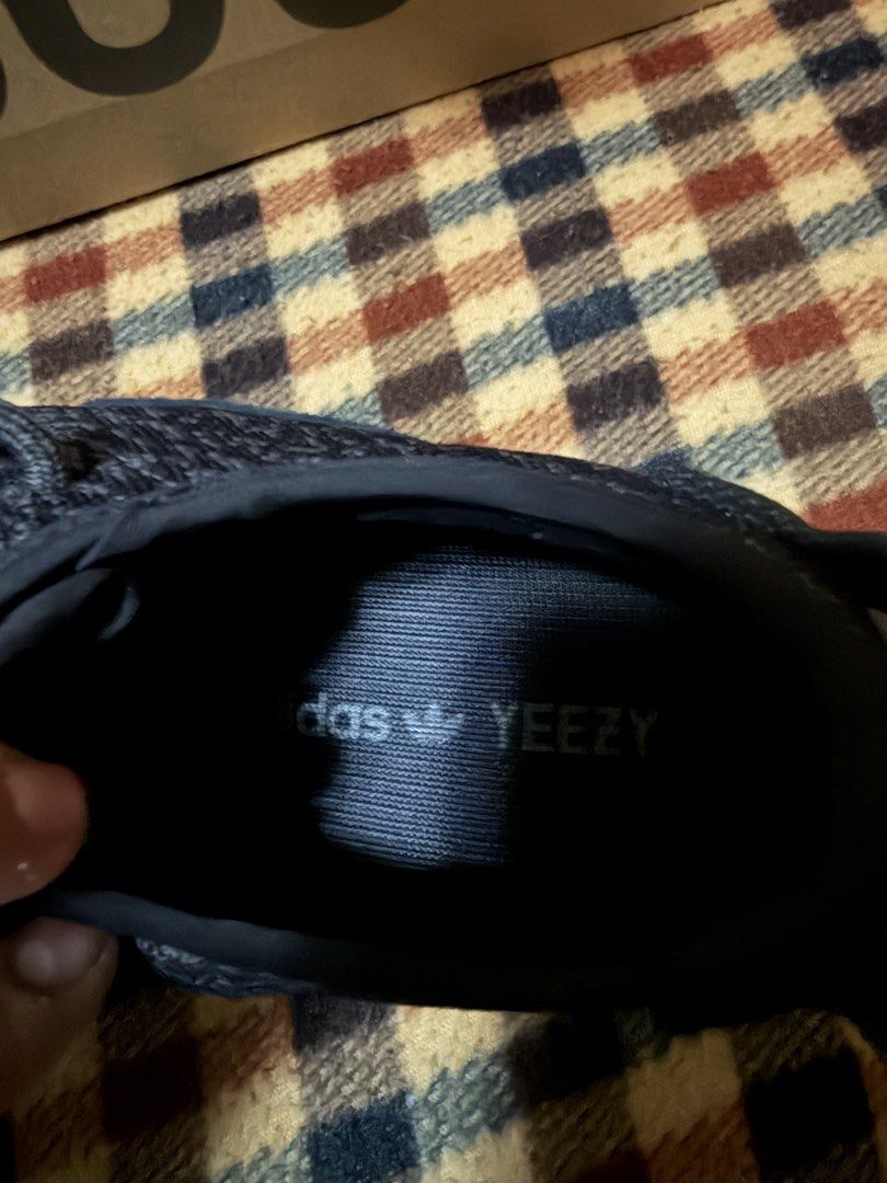 Adidas Yeezy 350 pirate black (Category: Sneakers) located in Quezon City. Submitted by djrakrakantodamax (Listing ID 1441480702, Image 3). Description: - Adidas Yeezy Boost 350 V2 - Color: Black - Size: US 9 - Condition: Brand New (implied by manufacturing date and original box) - Origin: Made in China - Manufacturing Date: October 2022 - Includes: Original Box - Features: Classic design, comfortable Boost sole.