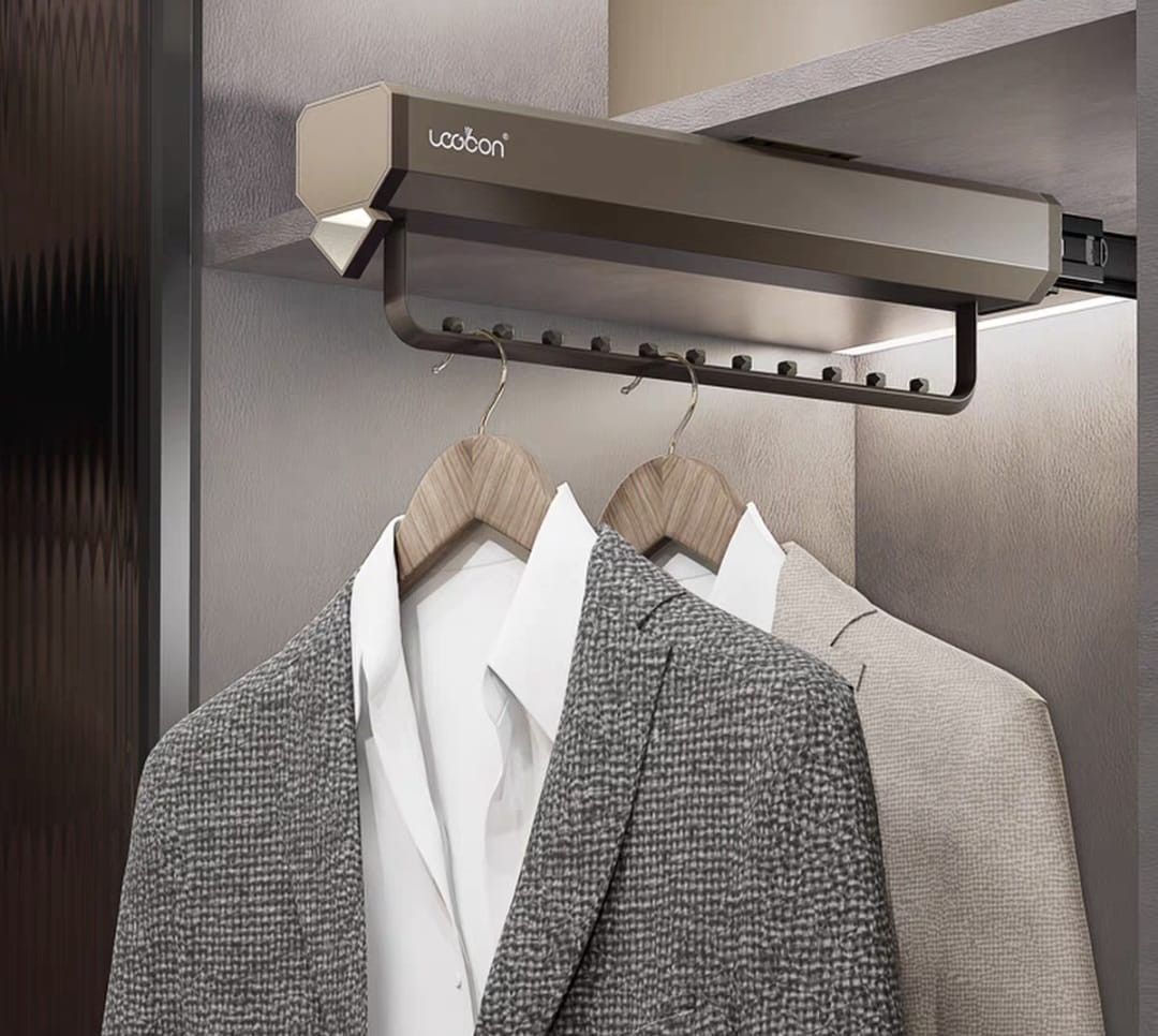 Adjustable Pull Down Clothes Rack (Category: Shelves, Cabinets & Racks) located in Singapore. Submitted by sgticketsfix (Listing ID 1441504054, Image 3). Description: BRAND NEW 2 SETS FOR SALE 1 for $35 2 for $65 - Adjustable Loobon Wardrobe Lift Hanger - Pull-down design for easy access to clothes - Maximizes closet space efficiently - Includes main unit and mounting hardware - Suitable for standard wardrobes - Keeps clothes neatly organized Sel