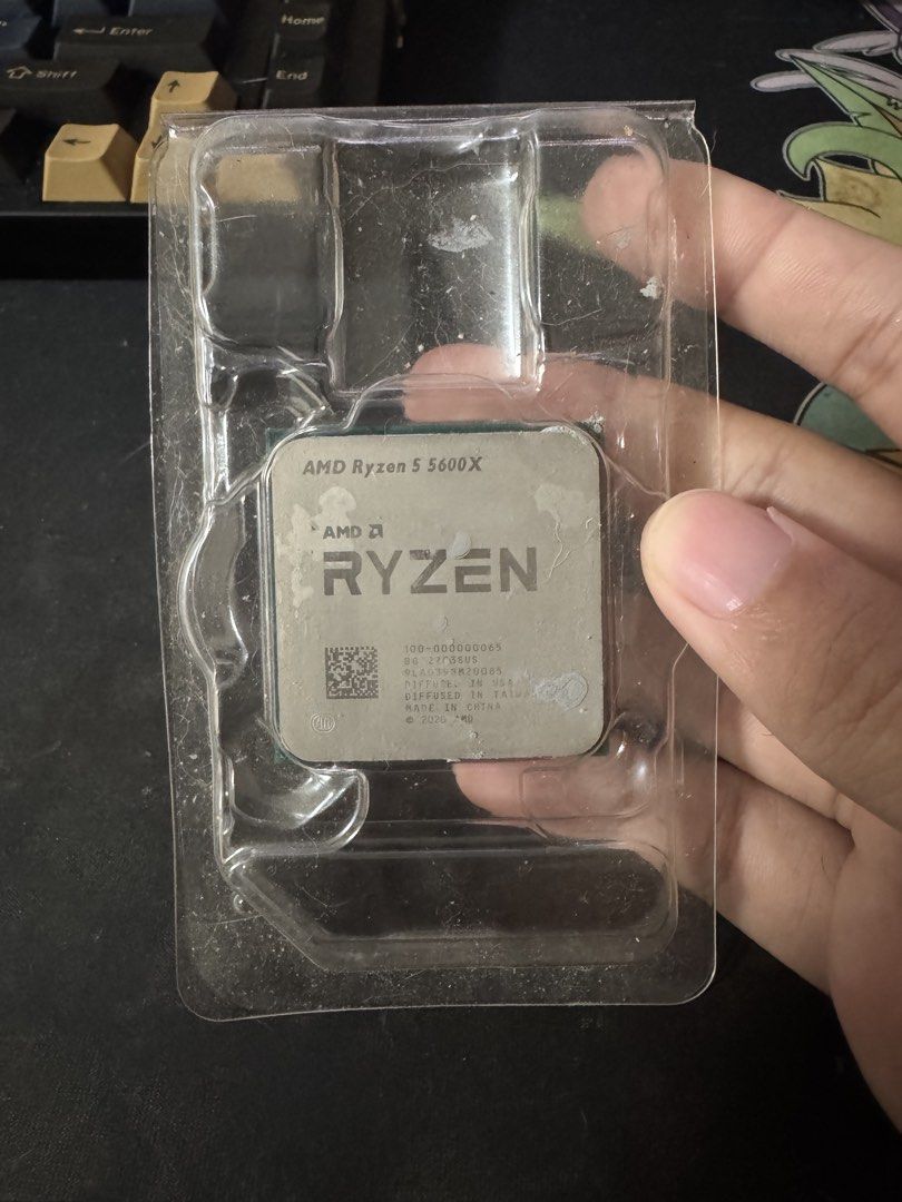 AMD Ryzen CPU Processor (Category: Computer Parts) located in Singapore. Submitted by ball_bell (Listing ID 1441502866, Image 1). Description: - AMD Ryzen CPU (5600x) - Pins are intact and in good shape - Ideal for new PC builds or system upgrades - Feel free to ask any questions!.