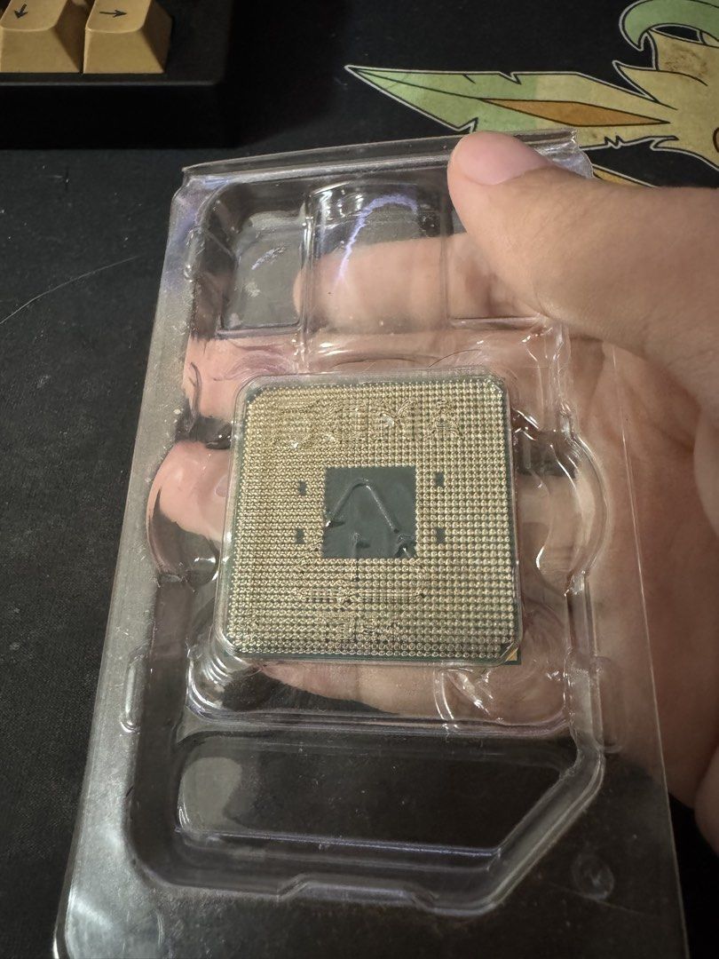 AMD Ryzen CPU Processor (Category: Computer Parts) located in Singapore. Submitted by ball_bell (Listing ID 1441502866, Image 2). Description: - AMD Ryzen CPU (5600x) - Pins are intact and in good shape - Ideal for new PC builds or system upgrades - Feel free to ask any questions!.