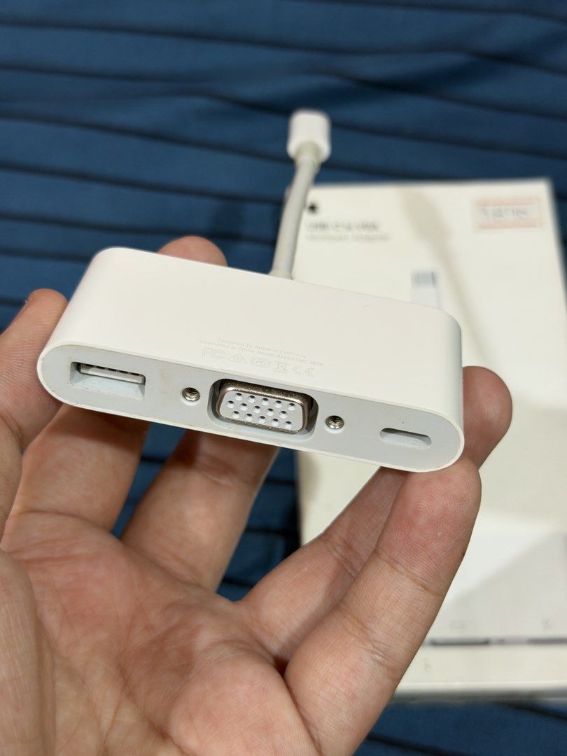 Apple USB-C to VGA Multiport Adapter (Category: Cables & Adaptors) located in Makati City. Submitted by gigidvd (Listing ID 1441483653, Image 3). Description: - Apple USB-C to VGA Multiport Adapter - Connect your MacBook to a VGA display - Additional USB-A and USB-C ports for peripherals - Ideal for presentations and older monitors.