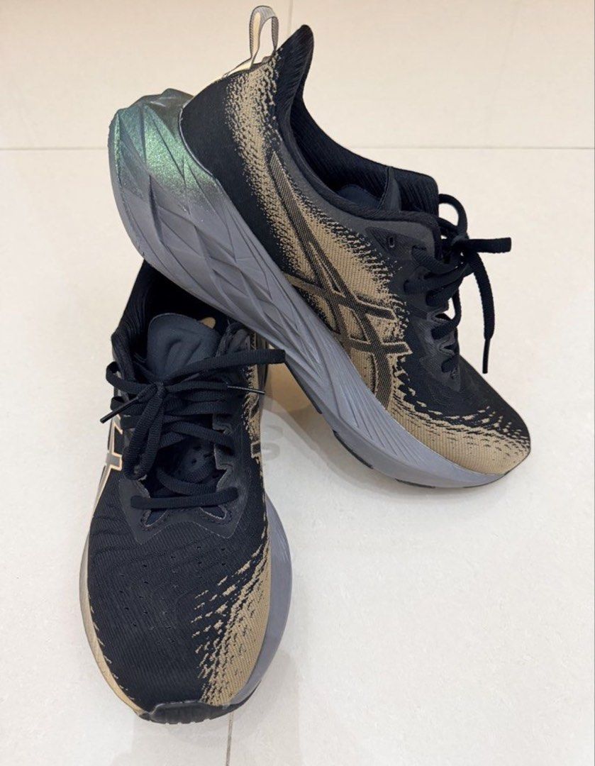 ASICS Novablast 4 Running Shoes Black Gold (Category: Sneakers) located in Singapore. Submitted by easybuy1881 (Listing ID 1441398543, Image 3). Description: - ASICS Novablast 3 Running Shoes - Color: Black with Gold Accents - Size: US Men's 9 - Condition: as brand new , worn once - Ideal for: Running and everyday wear - Features: Comfortable and supportive - self collect at Hougang .