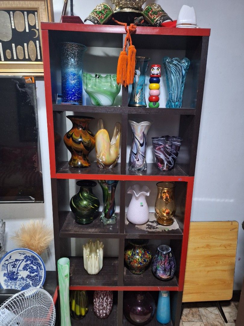 Assorted Glass Vases - Various Colors and Designs (Category: Vases & Decorative Bowls) located in Manila. Submitted by anotherhap50796 (Listing ID 1441434170, Image 3). Description: - Collection of unique glass vases - Available in different shapes and sizes - Features intricate patterns and vibrant colors - Ideal for home decor or as a thoughtful gift - Adds character to shelves and tables.