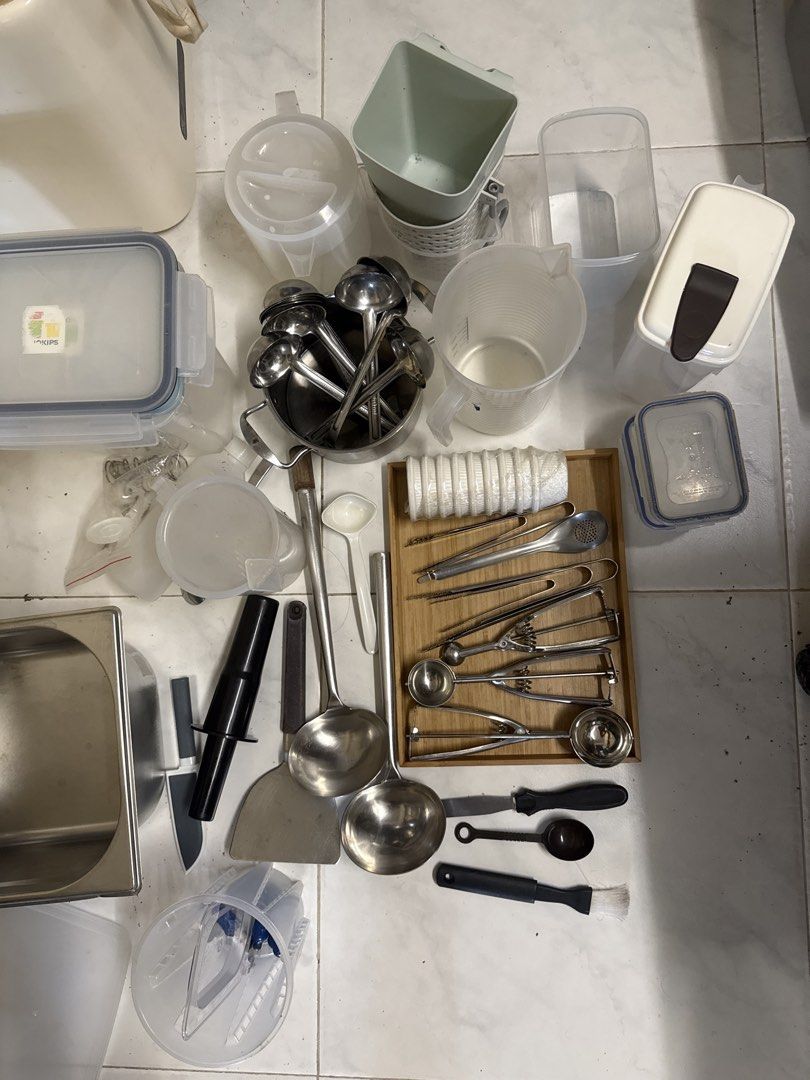 Assorted Kitchen Utensils, Measuring Cups, and Storage Bins