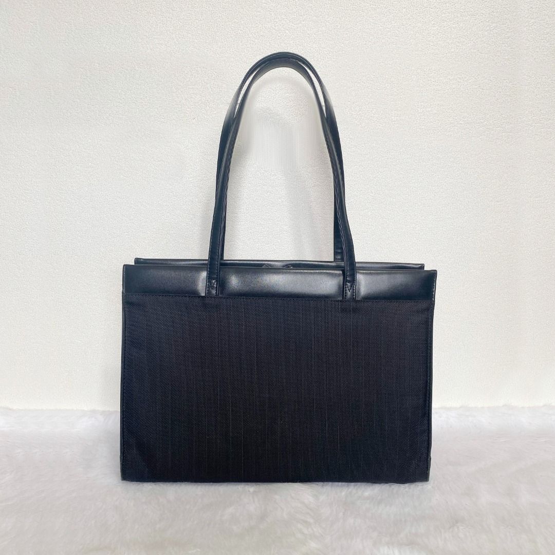 Atelier Saab Black Canvas Leather Document Bag (Category: Briefcases) located in Cebu City. Submitted by posh_avenue888 (Listing ID 1441559350, Image 3). Description: In very good condition showing tolerable signs of wear. From Japan. Crafted in canvas & genuine leather. 100% authentic or your money back!!! 14.5" x 11" x 3.5". .