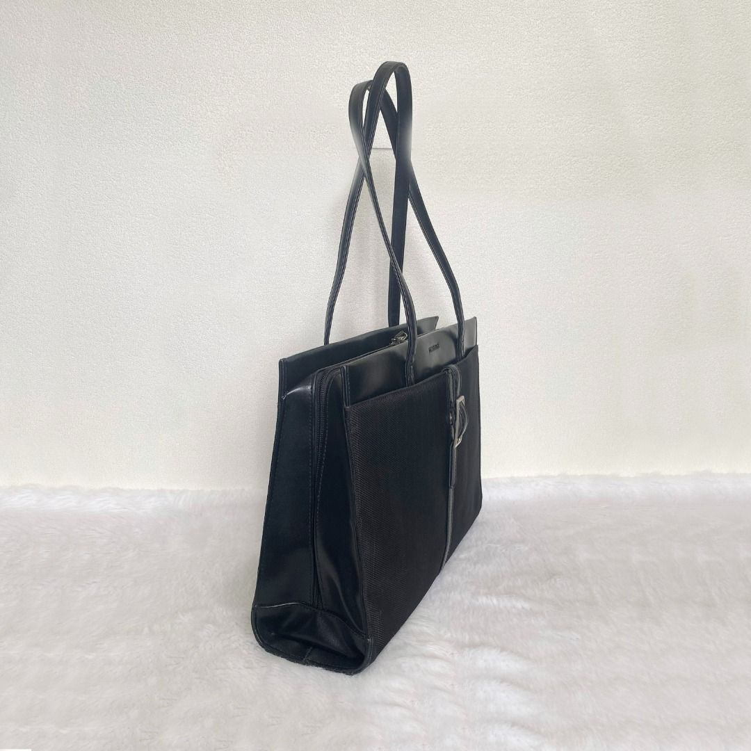 Atelier Saab Black Canvas Leather Document Bag (Category: Briefcases) located in Cebu City. Submitted by posh_avenue888 (Listing ID 1441559350, Image 2). Description: In very good condition showing tolerable signs of wear. From Japan. Crafted in canvas & genuine leather. 100% authentic or your money back!!! 14.5" x 11" x 3.5". .