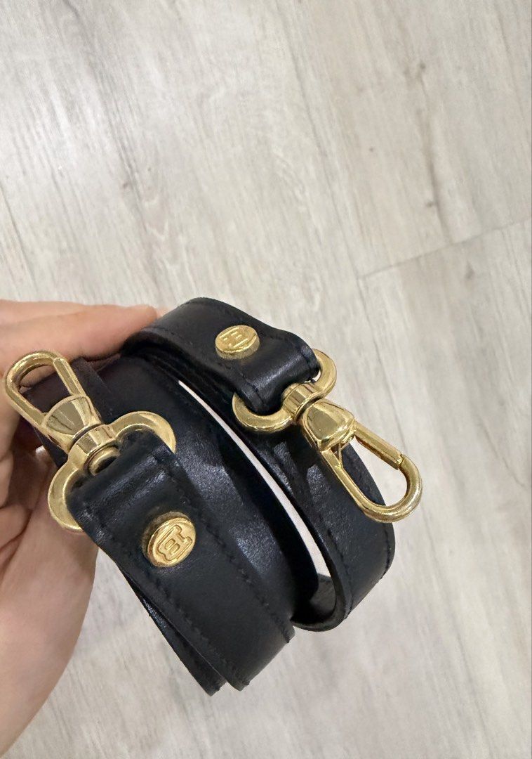 Bally Leather Strap with Gold Hardware (Category: Luxury Bags & Wallets) located in Quezon City. Submitted by 18john (Listing ID 1441477460, Image 1). Description: - Authentic Bally Calf leather strap - Elegant gold-tone hardware - Includes two secure clasps - Adorned with two decorative Bally logo studs - Versatile: perfect for various handbags - In good, pre-loved condition - Feel free to ask any questions!.