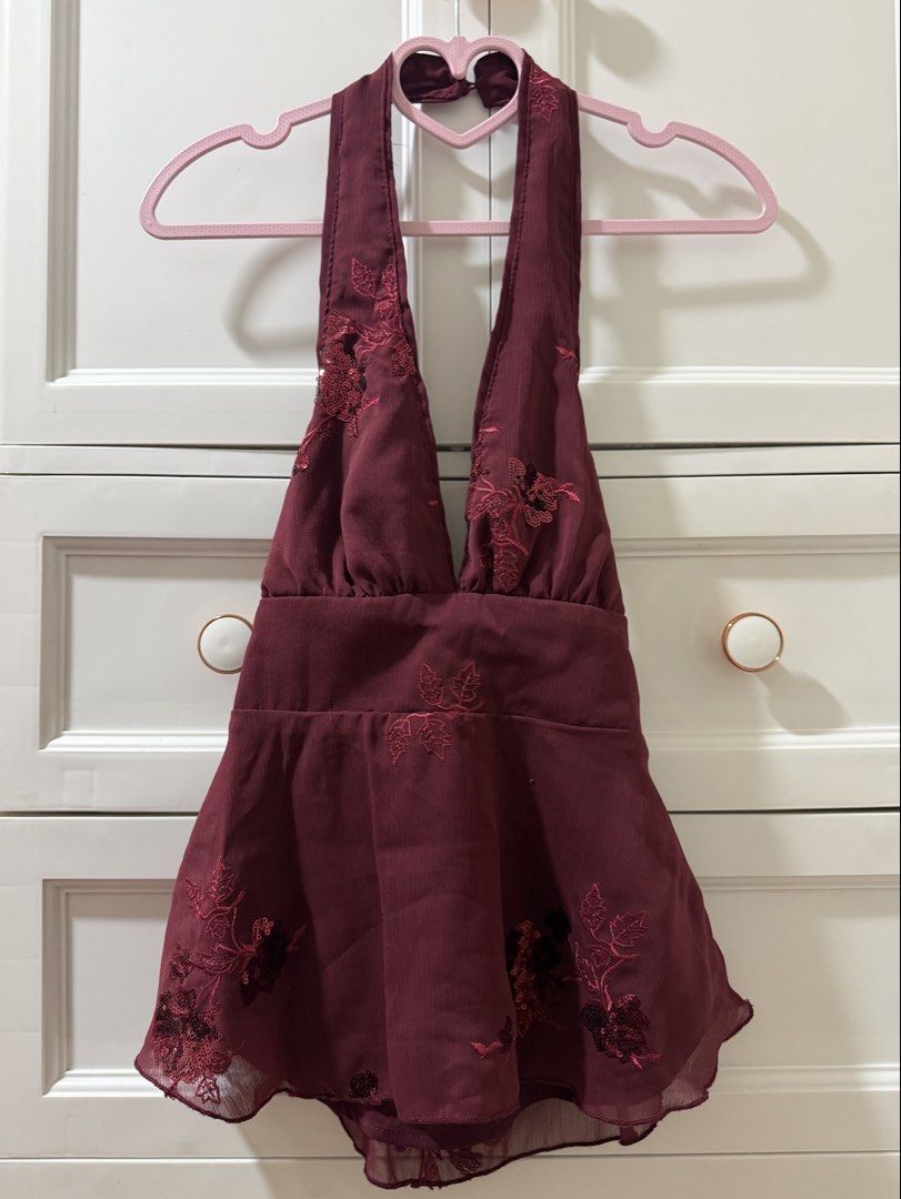 Beaded Halter Neck Top & Embroidered Skirt Set (Category: Sets or Coordinates) located in Taguig. Submitted by alyspendingmoolah (Listing ID 1441435942, Image 1). Description: - Maroon halter neck top with beaded details and peplum hem - Matching sheer embroidered A-line skirt - Both items are from SHEIN - Ideal for night outs or parties - Selling as a complete set - Top fits XS-S body frame .