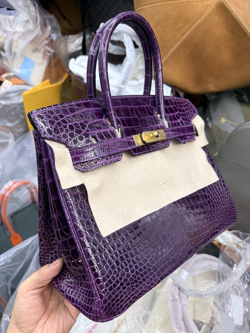 Birkin croc Purple 30 (Category: Luxury Bags & Wallets) located in Bacoor. Submitted by theluxarybelongings (Listing ID 1441558225, Image 2). Description: GHW stamp G Fully handstitched Fine stamp Mop: gcash, cash, bank transfer Meetup: ok Delivery: ok.
