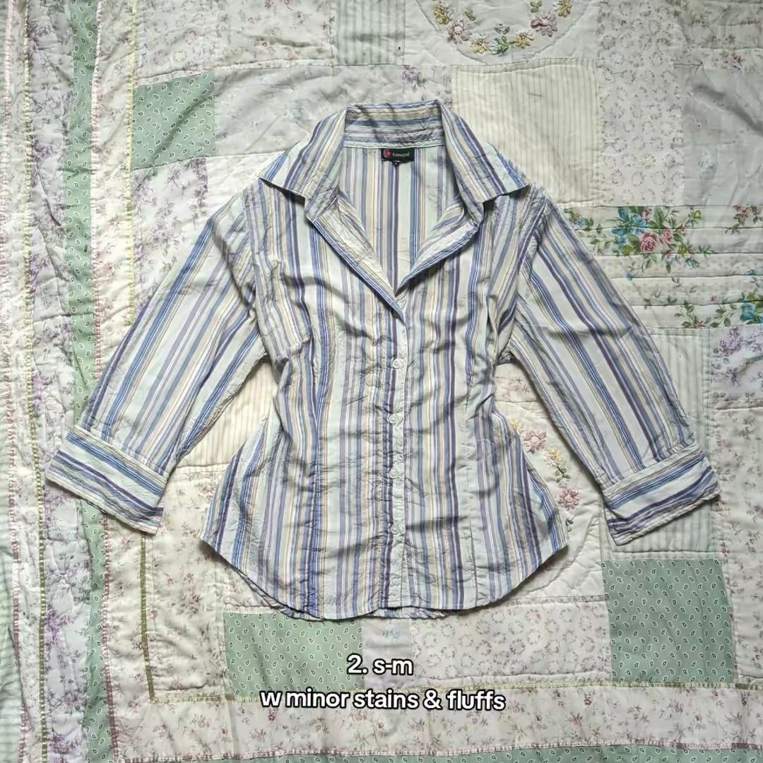 Blue and White Striped Button-Up Shirt (Category: Shirts) located in Santiago. Submitted by jainnesbowtique (Listing ID 1441443885, Image 1). Description: - Classic blue and white striped button-up shirt - Collared neckline - Long sleeves - Tailored fit - Minor stains and fluffs present (please check photos for details).