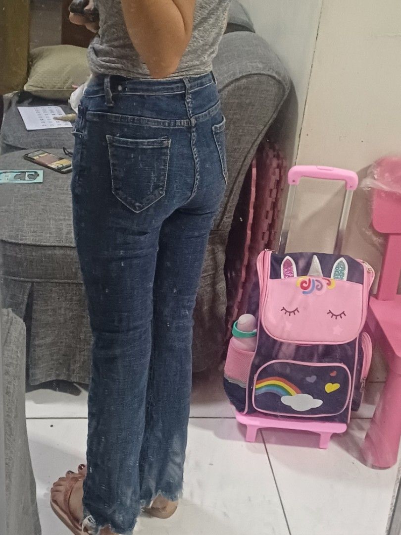 Blue Denim Jeans with Frayed Hem (Category: Jeans) located in Cavite. Submitted by breadandbutter00 (Listing ID 1441441372, Image 2). Description: - Trendy flared leg blue denim jeans - 25-26 waist - 150 only --seabank/gcash -lalamove, jnt, and angkas or joyride package -Dasma, Cavite .