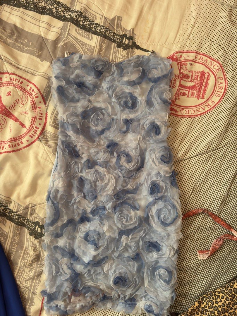 Blue Floral Rosette Strapless Mini Dress (Category: Dresses) located in Lucena. Submitted by miclara (Listing ID 1441421361, Image 2). Description: - xs-sm -Strapless mini dress - All-over rosette floral pattern in blue and white - Fun, textured fabric - Ideal for parties or a night out - Short length.