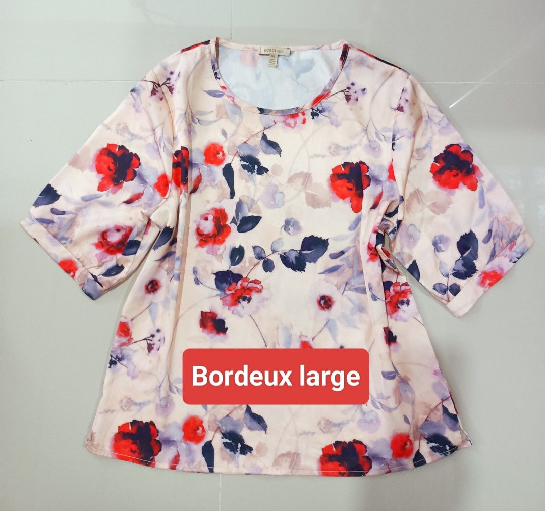 Bordeaux Floral Print Top - Size Large (Category: Blouses) located in Angeles City. Submitted by leichen57360 (Listing ID 1441405266, Image 1). Description: Lightweight top with a beautiful floral print. Features a round neckline and short sleeves. The fabric has a slight sheen. Great for casual wear or dressing up..