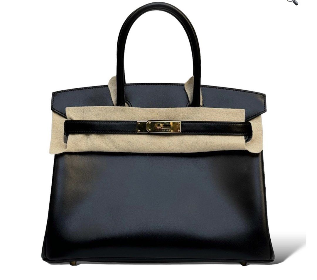 Box leather in 35cm (Category: Luxury Bags & Wallets) located in Bacoor. Submitted by theluxarybelongings (Listing ID 1441460654, Image 2). Description: Box leather In GHW stamp G Available shades: black, maroon, blue In size 35cm only Mop: cash/gcash, bank transfer Delivery: ok Meetups: ok Sure buyer only.