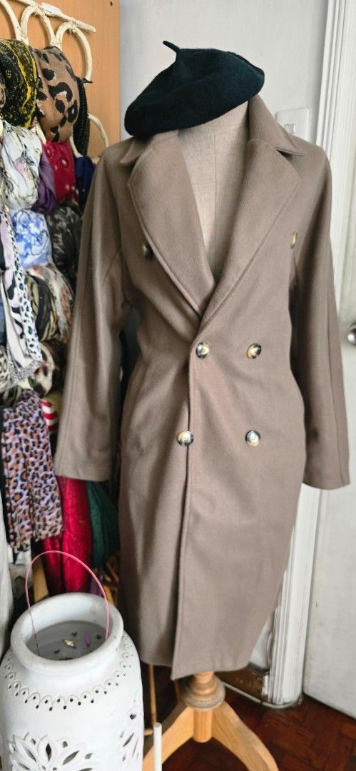 Brown Double-Breasted Trench Coat with Belt (Category: Coats, Jackets and Outerwear) located in Manila. Submitted by foxydivas (Listing ID 1441395574, Image 1). Description: - Brand new. selling it 50% off from orig price - Classic brown trench coat - Double-breasted style - Features elegant gold buttons - Includes a matching belt to cinch the waist - Versatile: wear open or closed - Ideal for cooler weather rfs: bought double.