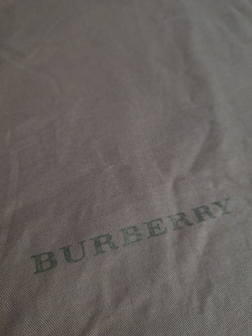 Burberry Dust Bag (Category: Luxury Bags & Wallets) located in Sibulan. Submitted by studioxano (Listing ID 1441483750, Image 2). Description: burberry dust bag size large height 19.5" / Width 23.5" Lay flat dimes excellent condi needwash.