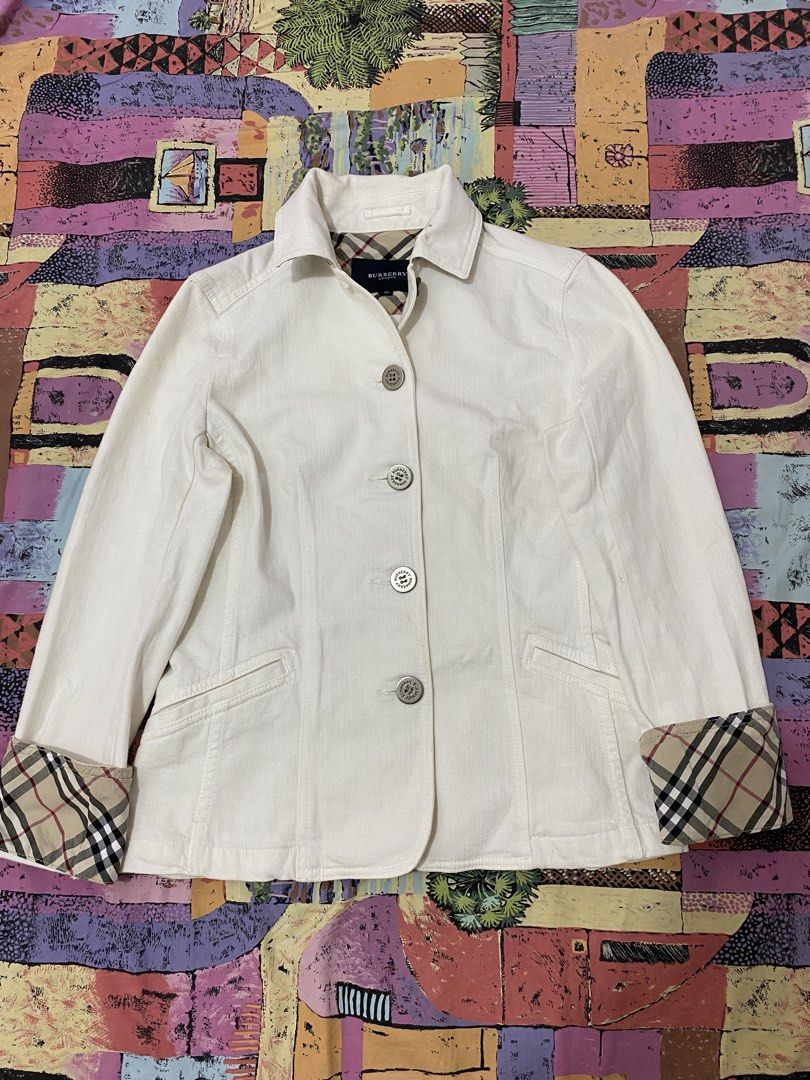 Burberry London White Denim Jacket with Nova Check Lining (Category: Coats, Jackets and Outerwear) located in Manila. Submitted by gentleturtle-1726 (Listing ID 1441487488, Image 1). Description: - Authentic White Burberry Jacket - Iconic Nova Check lining and cuffs - Classic button front closure - Two convenient front pockets - Size: 38 - A versatile addition to any wardrobe open for swap hp laptop .