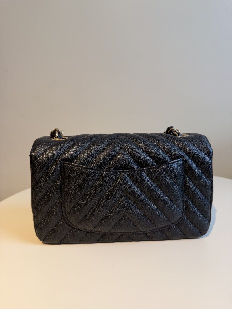 Chanel Black Chevron Flap Bag (Category: Luxury Bags & Wallets) located in Quezon City. Submitted by _cherryontop_ (Listing ID 1441515619, Image 2). Description: Mini Rec in Black Caviar Chevron Gold Hardware Discontinued piece,Rare in preloved market full set except receipt with authentication.