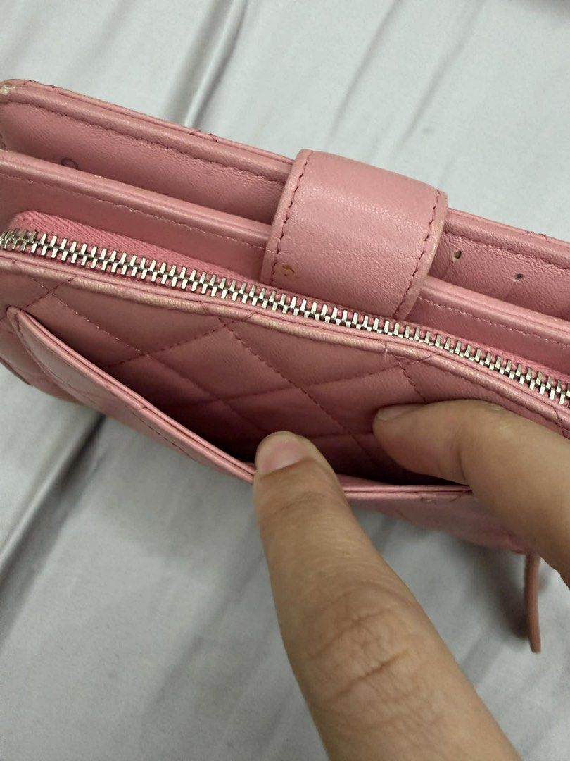 Chanel Pink Quilted Leather Bi-Fold Wallet (Category: Luxury Bags & Wallets) located in Manila. Submitted by tashvintagefinds (Listing ID 1441431685, Image 3). Description: - Chanel wallet - Secure snap button closure - Ample card slots - Shows some signs of wear (edges, interior) - with entrupy.