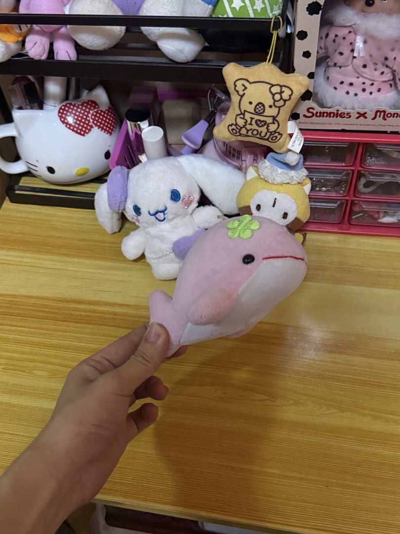 Cinnamoroll, Rascal, and Pink Dolphin keychain (Category: Character Goods) located in Bulacan. Submitted by apparela (Listing ID 1441492540, Image 2). Description: take all for ₱250 no issues rascal is og cinna and dolphin are from claw machine.