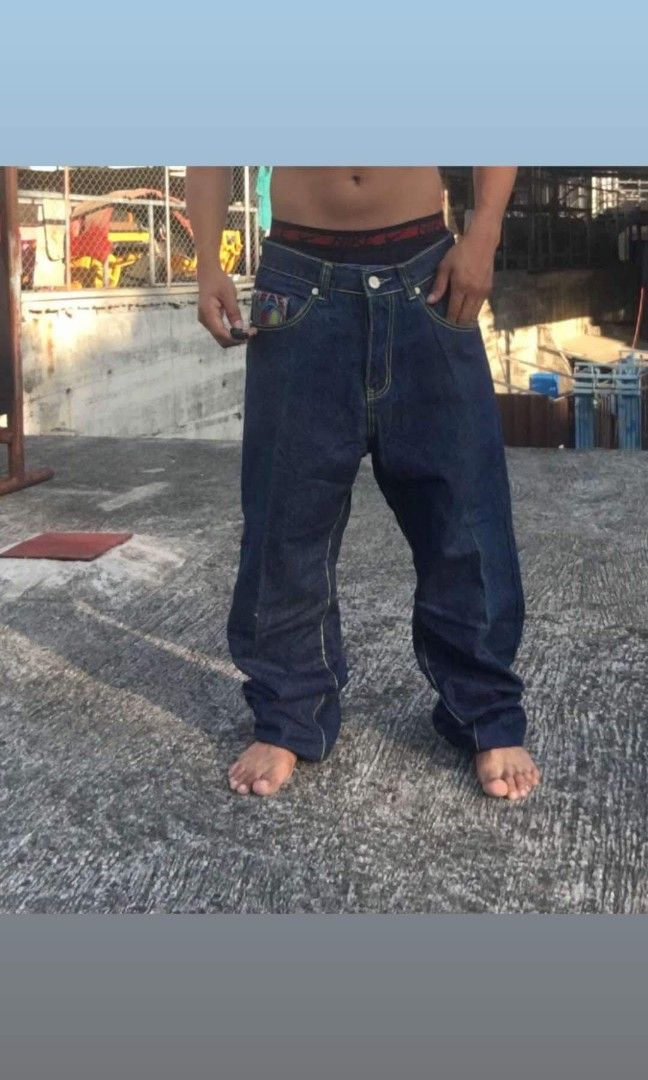 Coogi Jeans W34 (Category: Jeans) located in Caloocan City. Submitted by itsme_bald (Listing ID 1432414655, Image 2). Description: - Authentic Coogi Jeans - Size: W34 - Colorful embroidered details - Classic five-pocket design - Straight leg cut - Iconic Coogi logo on back pockets - Yellow stitching - Red inner lining.