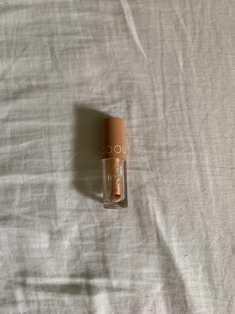 Coou Glitter Liquid Eyeshadow (Category: Makeup) located in Quezon City. Submitted by closetkisses (Listing ID 1441414326, Image 1). Description: bought in japan shade: shimmery rose gold mop: gcash loc: quezon city, philippines nationwide shipping (j&t, grab, lalamove) .