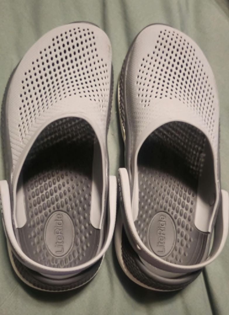 Crocs LiteRide Clog Grey Men's Shoes (Category: Slippers & Slides) located in San Juan City. Submitted by karlajoanne (Listing ID 1441461397, Image 3). Description: - Grey Crocs LiteRide clogs - Perforated for breathability - Features comfortable LiteRide footbed - Easy slip-on design with heel strap - Ideal for casual wear and activities SIZE US M5 W7 ORIGINAL - bought in Crocs Outlet Store in the US.