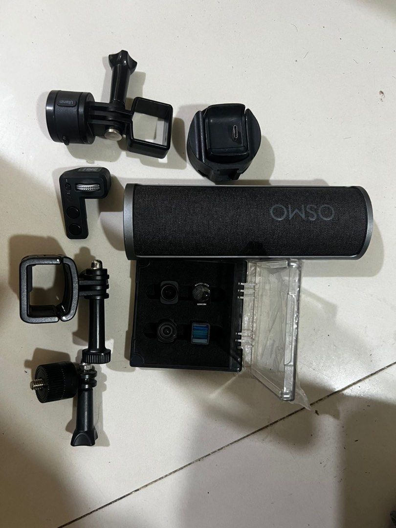 DJI Osmo pocket 1 Action Camera Accessories Bundle (Category: Cameras) located in Caloocan City. Submitted by jasonleet36121 (Listing ID 1441378595, Image 1). Description: - Complete accessory set for DJI Osmo Action camera. - Includes various mounts and adapters for diverse shooting scenarios. - Comes with a protective case. - Lens filters included. - Everything you need to enhance your Osmo Action footage..