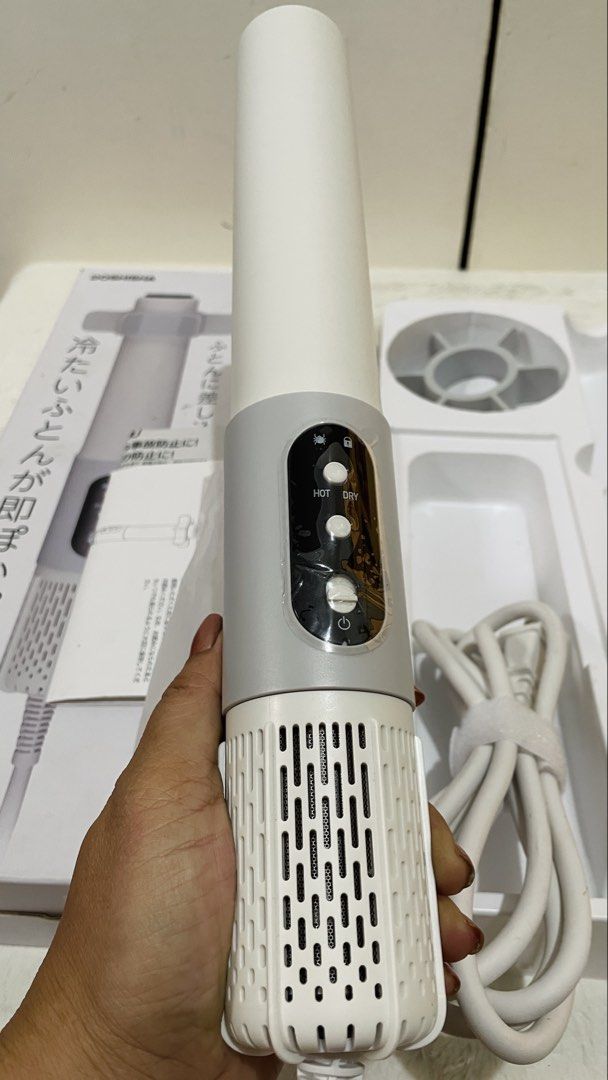 Doshisha Futon Jet for warming, drying & dust mite mode (Category: Cleaning Tools & Supplies) located in Quezon City. Submitted by sissymissy1527 (Listing ID 1441536300, Image 3). Description: ➡️110volts ➡️Tested working ➡️Doshisha Futon Jet (model BZKH-04WH), a compact, hose-free (futon dryer) featuring a white finish. ➡️It operates by inserting the device directly into the futon, using high-speed jet warm air to dry and warm bedding.The dryer i