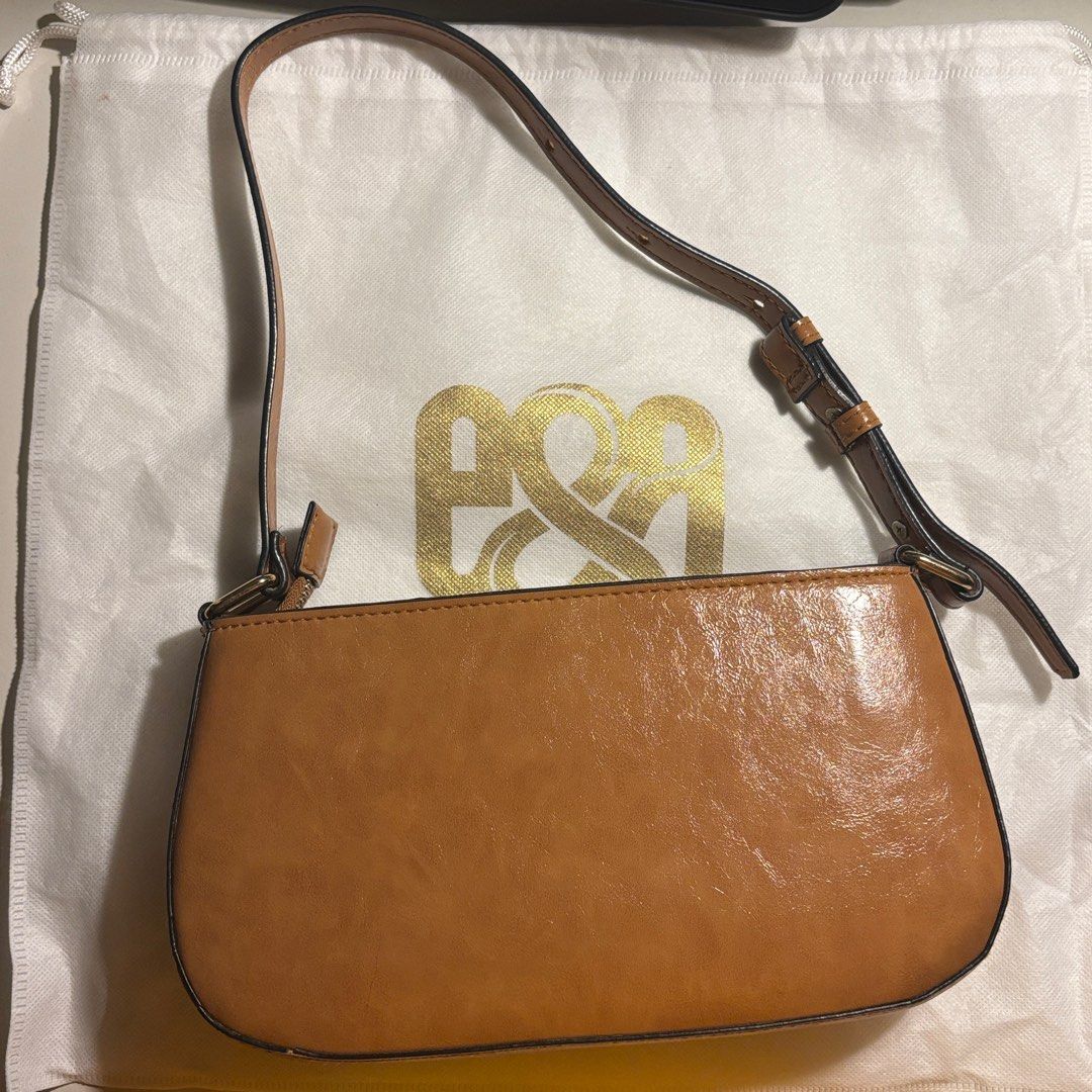 Eve & Adam Baguette Bag (Category: Luxury Bags & Wallets) located in Ilagan. Submitted by ystroberry (Listing ID 1441501969, Image 2). Description: - adjustable strap - with dust bag and tote bag - og price: ₱1k plus.