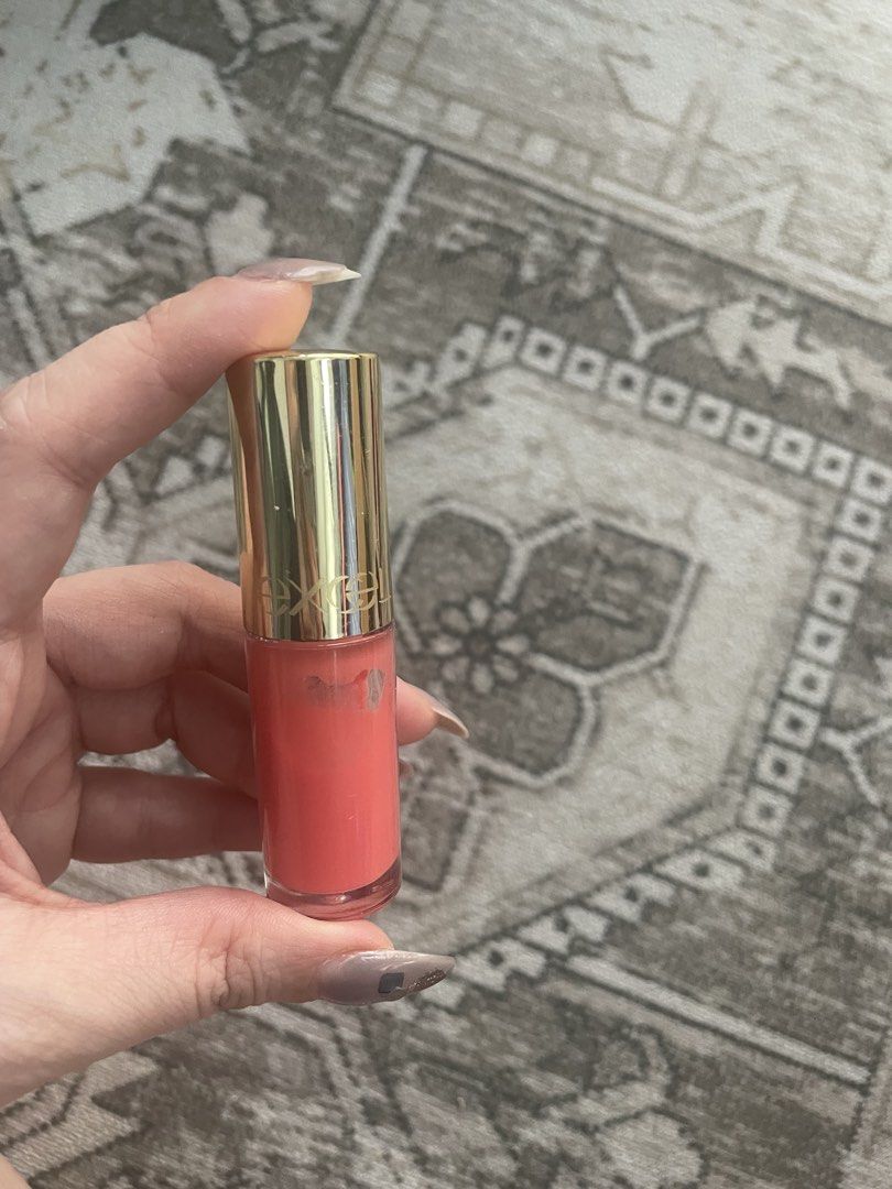 Excel Lip Gloss LO3 Coral Pink (Category: Makeup) located in Makati City. Submitted by candicedayo (Listing ID 1441454376, Image 1). Description: - Excel Lip Gloss in shade LO3 - Lovely coral pink shade - Perfect for adding a pop of color - Easy to apply - Applicator included - Selling because of an overabundance of lip products.