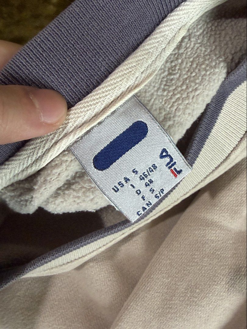 Fila Sweatshirt Beige Crewneck Pullover Size S (Category: Coats, Jackets and Outerwear) located in Manila. Submitted by chamyto_ (Listing ID 1441564023, Image 2). Description: - Classic Fila sweatshirt - Color: Beige with navy blue logo - Style: Crewneck - Size: Tagged S (fits like S) - Measurements: Chest width 21", Length 24" - Ideal for casual wear.