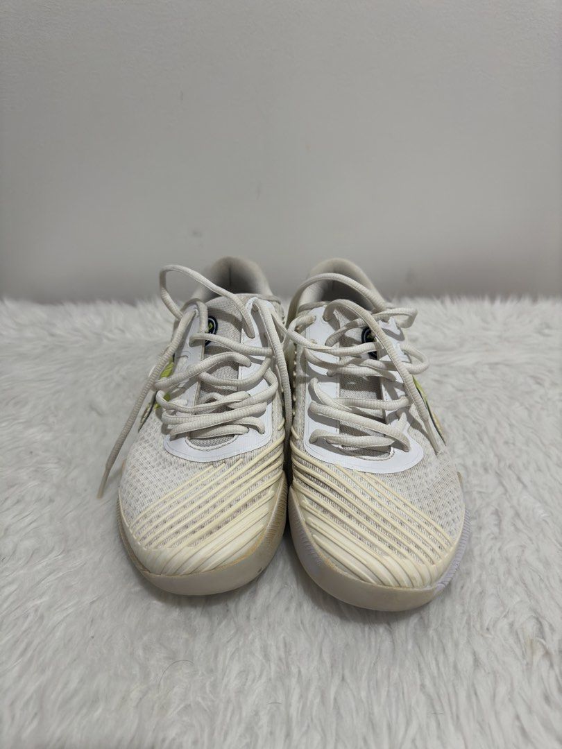 Fila White & Yellow Athletic Shoes (Original) (Category: Sneakers) located in Manila. Submitted by mingmingtsu_ (Listing ID 1441425147, Image 2). Description: Worn by a 37W - White and yellow Fila athletic shoes - Lace-up closure - Size: 6.5 US / 37.5 EUR / 235 CM - Ideal for running or training - Minor scuffs on soles and toe area.