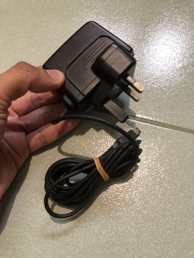 Gameboy SP authentic Nintendo 220V wall adapter charger (Category: Cables & Chargers) located in Quezon City. Submitted by markgolveo (Listing ID 1441482354, Image 2). Description: Gameboy SP authentic Nintendo 220V wall adapter charger.