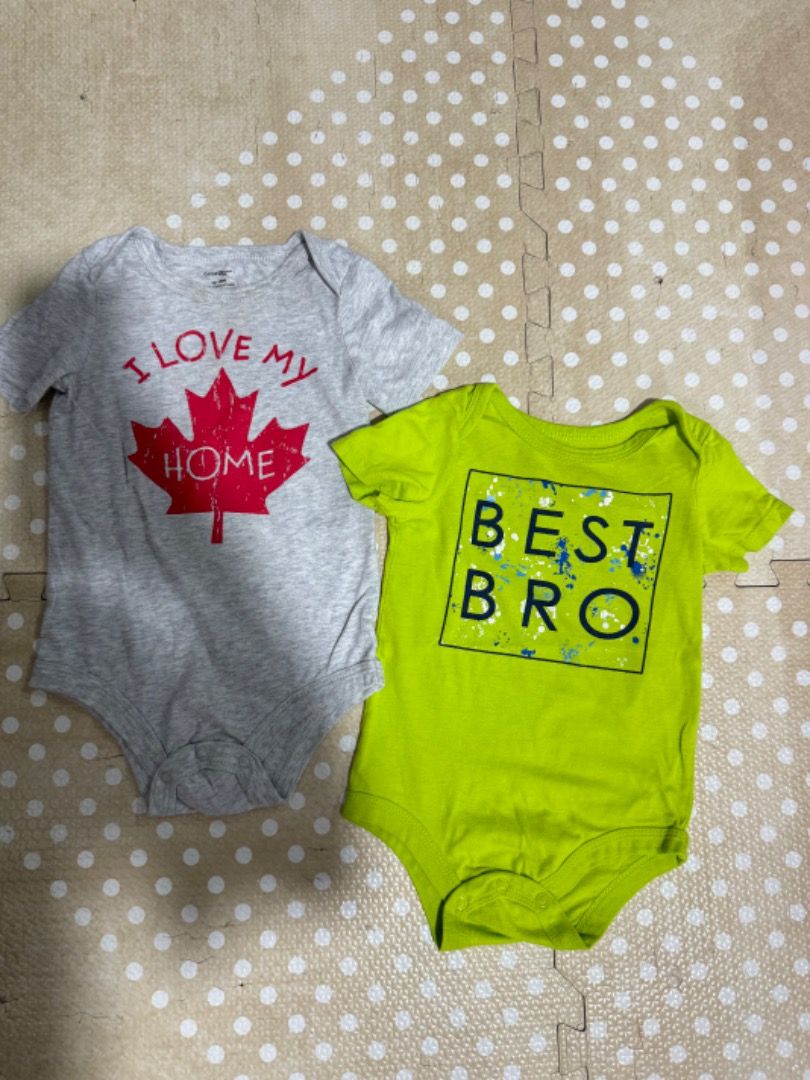 George Baby Bodysuits 12-18M (2 pcs) (Category: Babies & Kids Fashion) located in Manila. Submitted by louvemaria (Listing ID 1441489015, Image 1). Description: - Set of 2 cute baby bodysuits from George - Size: 12-18 months - Design 1: Grey with 'I LOVE MY HOME' and maple leaf graphic - Design 2: Bright green with 'BEST BRO' splatter design - Material: 100% Cotton - Ideal for everyday wear or as a thoughtful gift.
