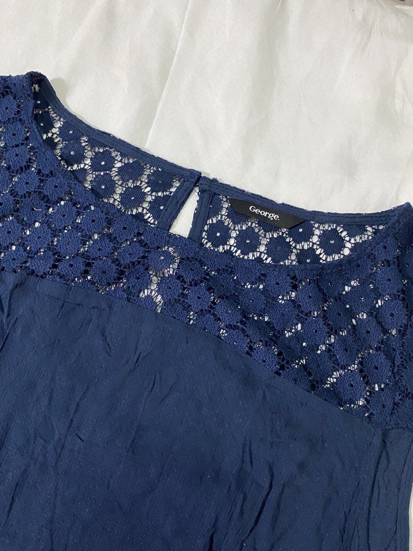 GEORGE Navy Blue Lace Top Blouse ****MEASUREMENTS AND MORE DETAILS ARE ALREADY IN THE DESCRIPTION, PAKIBASA NALANG PO.** (Category: Blouses) located in San Mateo. Submitted by sellstuffs_mnl (Listing ID 1441570977, Image 2). Description: **NO WHEN WORN!** Still in Excellent Condition Size fits: Small, Medium Color Rate: 10/10 No stains, No holes, no tastas Dimensions: (Measured using Tape Measure) • Shoulders to Shoulders: 13.5 - 14 inches •Lengt
