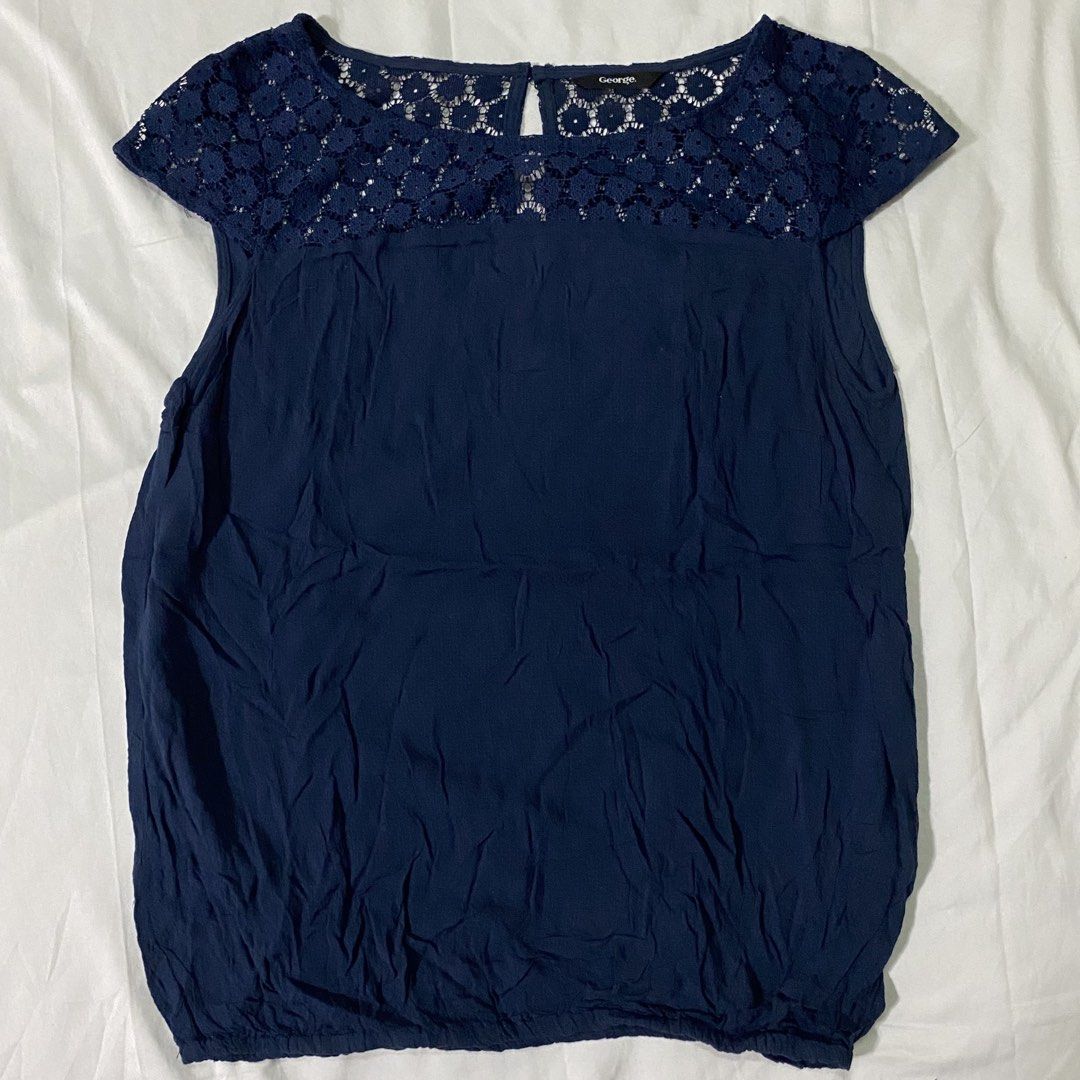 GEORGE Navy Blue Lace Top Blouse ****MEASUREMENTS AND MORE DETAILS ARE ALREADY IN THE DESCRIPTION, PAKIBASA NALANG PO.** (Category: Blouses) located in San Mateo. Submitted by sellstuffs_mnl (Listing ID 1441570977, Image 1). Description: **NO WHEN WORN!** Still in Excellent Condition Size fits: Small, Medium Color Rate: 10/10 No stains, No holes, no tastas Dimensions: (Measured using Tape Measure) • Shoulders to Shoulders: 13.5 - 14 inches •Lengt