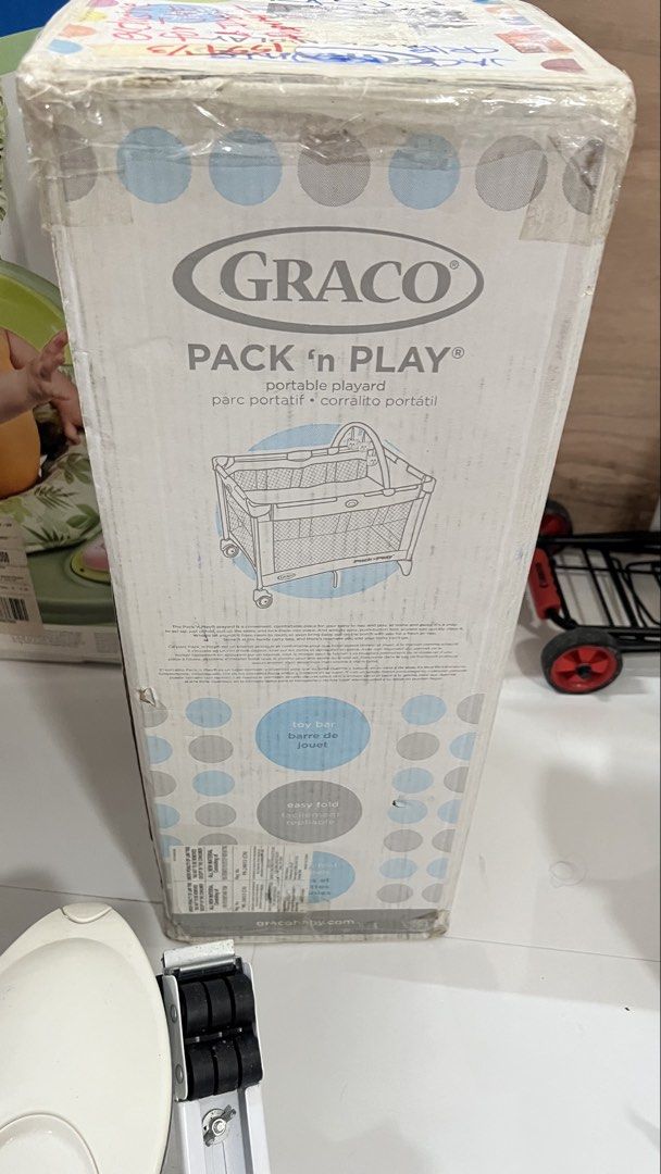 Graco Pack 'n Play Portable Playard (Category: Cots & Cribs) located in Pasig City. Submitted by olxph_joey.3363 (Listing ID 1441469875, Image 1). Description: - Graco Pack 'n Play portable playard - Ideal for travel and home use - Simple setup and folding mechanism - Features wheels for easy mobility - Comes in original packaging - Suitable for babies and toddlers.