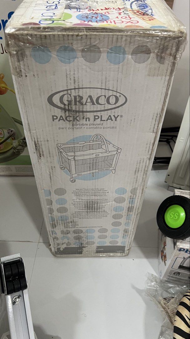 Graco Pack 'n Play Portable Playard (Category: Cots & Cribs) located in Pasig City. Submitted by olxph_joey.3363 (Listing ID 1441469875, Image 2). Description: - Graco Pack 'n Play portable playard - Ideal for travel and home use - Simple setup and folding mechanism - Features wheels for easy mobility - Comes in original packaging - Suitable for babies and toddlers.