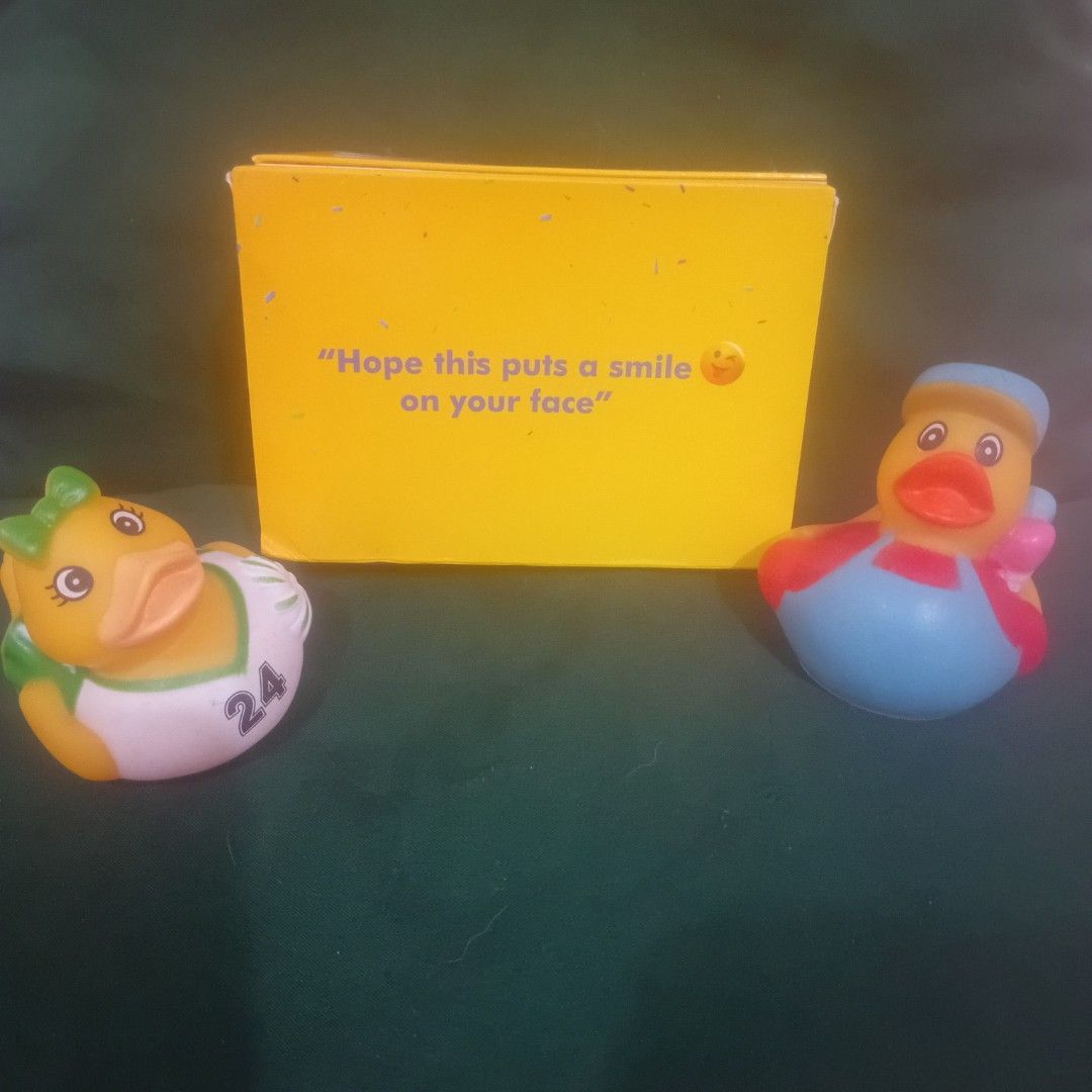 Happy Load Rubber Ducks with Box Timezone Collectibles (Category: Designer & Blind Box Toys) located in Silang. Submitted by trish125 (Listing ID 1441401010, Image 3). Description: - Adorable pair of rubber ducks - One duck dressed as a baby (diaper & bib) - Second duck in overalls & hat - Comes in a yellow "Happy Load" box with display window (has dents) - Includes a "Hope this puts a smile on your face" smiley card - Ideal for collectors or as 
