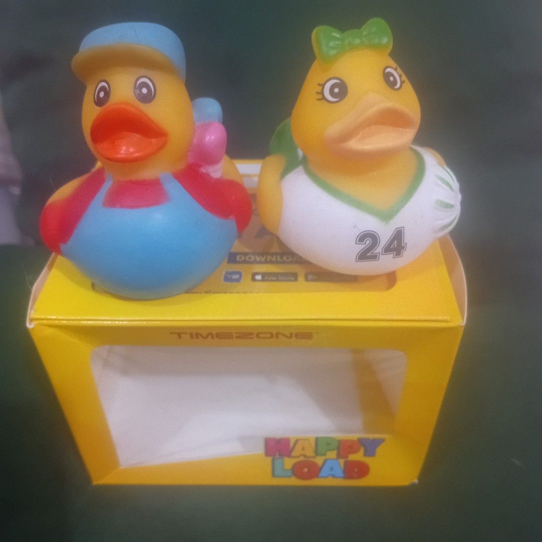 Happy Load Rubber Ducks with Box Timezone Collectibles (Category: Designer & Blind Box Toys) located in Silang. Submitted by trish125 (Listing ID 1441401010, Image 1). Description: - Adorable pair of rubber ducks - One duck dressed as a baby (diaper & bib) - Second duck in overalls & hat - Comes in a yellow "Happy Load" box with display window (has dents) - Includes a "Hope this puts a smile on your face" smiley card - Ideal for collectors or as 
