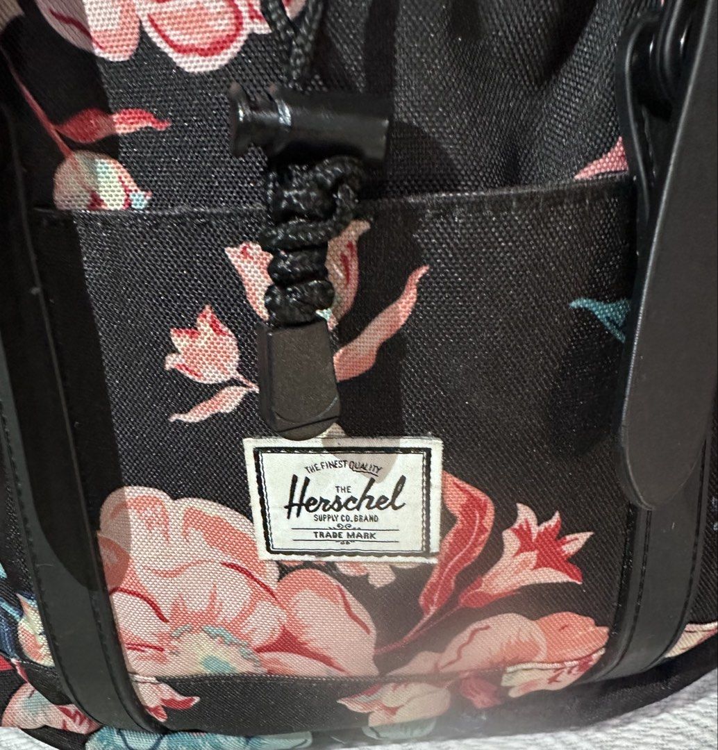 Herschel Supply Co. Floral Backpack (Category: Backpacks) located in Cavite. Submitted by bags_unltd143 (Listing ID 1441392681, Image 3). Description: Black backpack with a pretty floral print. Features adjustable straps and a drawstring closure. Has a front pocket for easy access. Great for school or everyday use. Durable material..