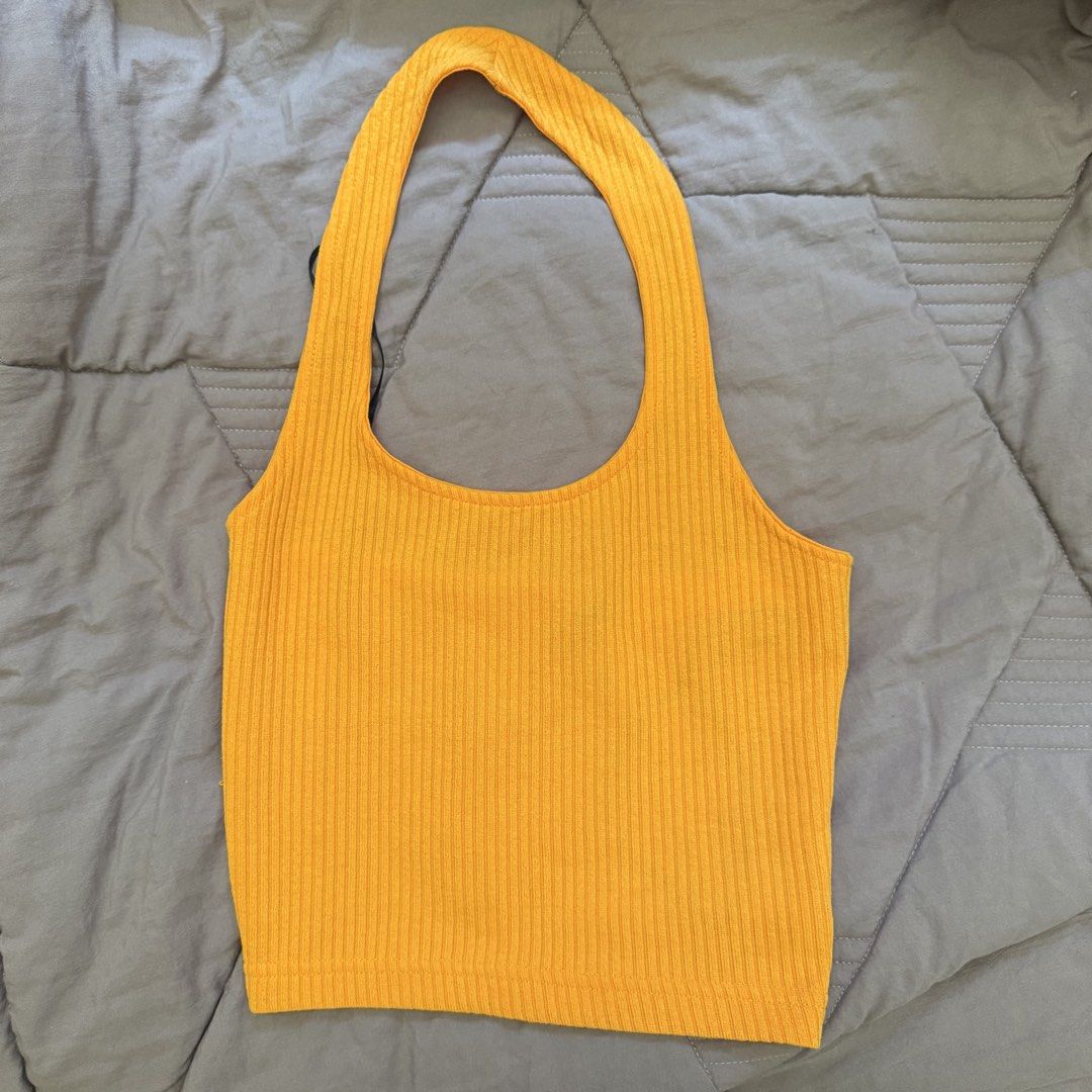 H&M Ribbed Halter Crop Top Orange Yellow (Category: Sleeveless) located in Manila. Submitted by strawberryj21 (Listing ID 1441583706, Image 3). Description: - H&M ribbed halter crop top - Bright orange-yellow color - Comfortable and stretchy material Worn once.