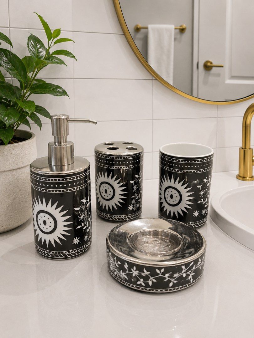Home box UAE 4pcs set ceramic bathroom stuff (Category: Bathtub & Bath Accessories) located in Mandaluyong City. Submitted by home_box.ae (Listing ID 1441433557, Image 1). Description: This Kookee 4-piece ceramic bathroom set features a distinctive monochrome floral and sunburst design.