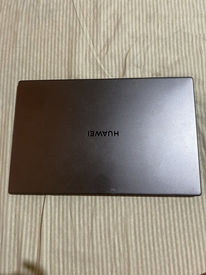 Huawei Matebook Laptop - Dark Grey (Category: Laptops & Notebooks) located in Minglanilla. Submitted by kiearaabel90584 (Listing ID 1441522014, Image 3). Description: NEGOTIABLE!!!! FREE DELIVERY (METRO CEBU & MINGLANILLA ONLY) 💻 Huawei MateBook D14 📌 Color: Space Gray • Bought for 40k in 2021 • No longer needed Specifications: • AMD Ryzen 5 3500U Processor (up to 3.7GHz) • AMD Radeon Vega 8 Graphics • 8GB DDR4 RAM • 512GB PCIe SSD • 14-inch Fu