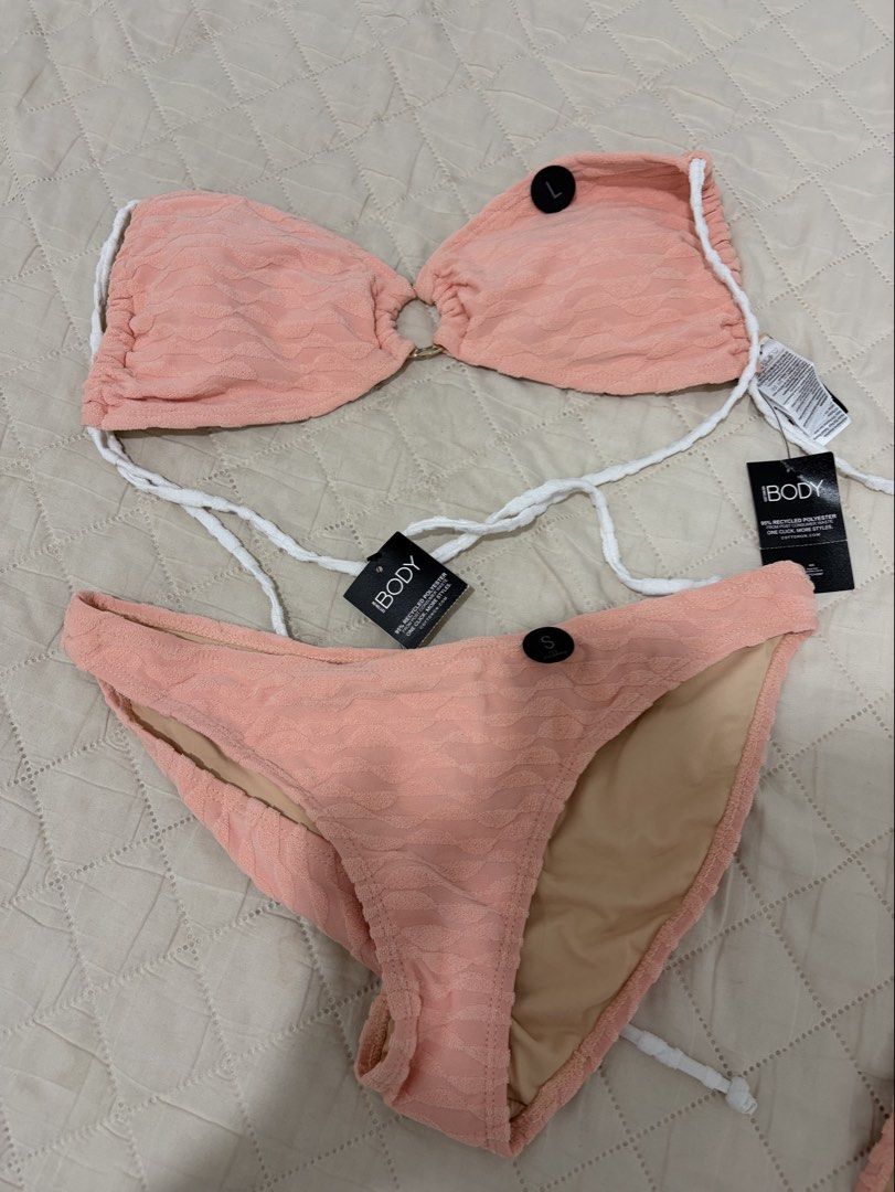 IBODY Pink Textured Bikini Set - Size L Top, S Bottom (Category: Bikinis & Swimsuits) located in Pateros City. Submitted by dendenden15 (Listing ID 1441506557, Image 2). Description: - IBODY pink textured bikini set - Top: Size L - Bottoms: Size S - Adjustable ties at neck and back - Soft, comfortable textured fabric - Perfect for beach or pool days.