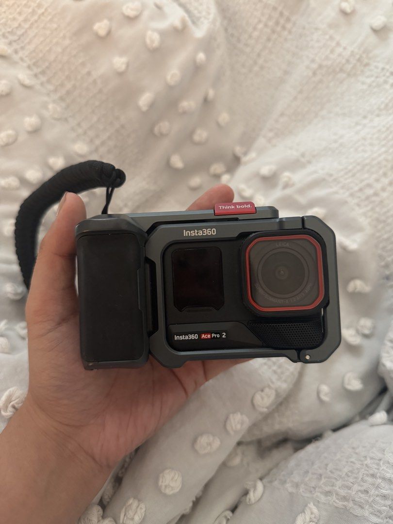 Insta360 Ace Pro 2 Action Camera with Protective Cage (Category: Cameras) located in Manila. Submitted by bernarenasxx (Listing ID 1441412383, Image 1). Description: - Insta360 Ace Pro 2 camera - Includes protective cage - Ideal for vlogging and sports - Ready for your next adventure - Feel free to ask questions Rfs: declutter and di masydo gngmt.