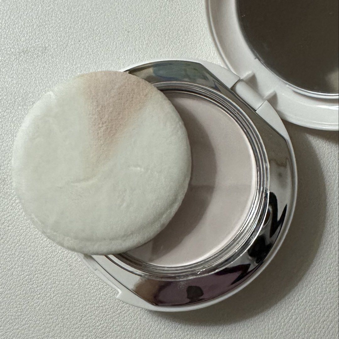 issy universal fixing powder (Category: Makeup) located in General Trias. Submitted by misasells (Listing ID 1441532455, Image 1). Description: no box, swatched only hence the sponge stain. few dirt marks on the packaging as well. .